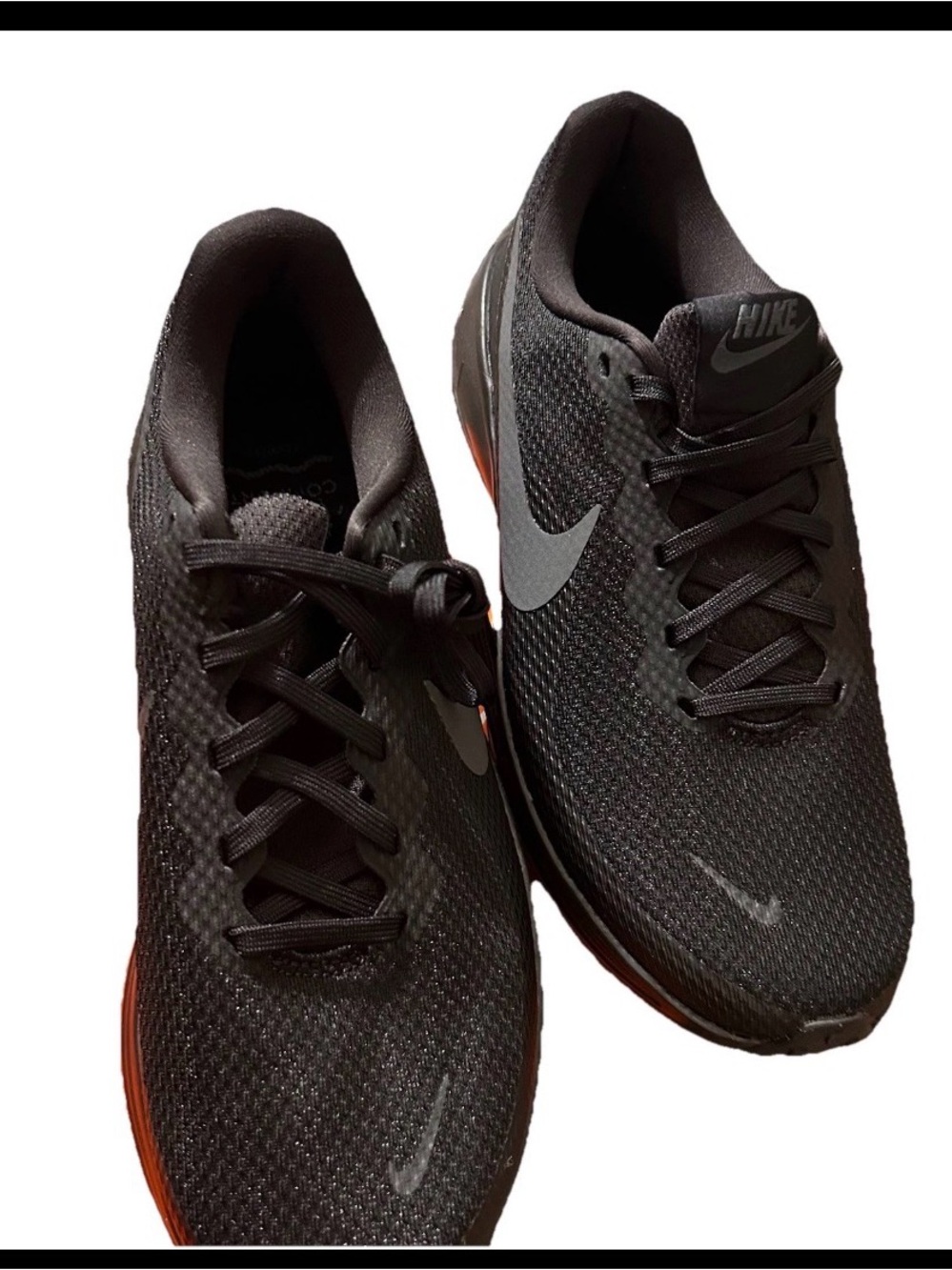 Nike Men’s Black Athletic Running Shoes with Gray Swoosh and Orange Accent